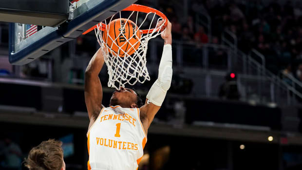 Tennessee Volunteers guard Kennedy Chandler (1) reacts as he dunks in the 2022 NCAA Tournament.
